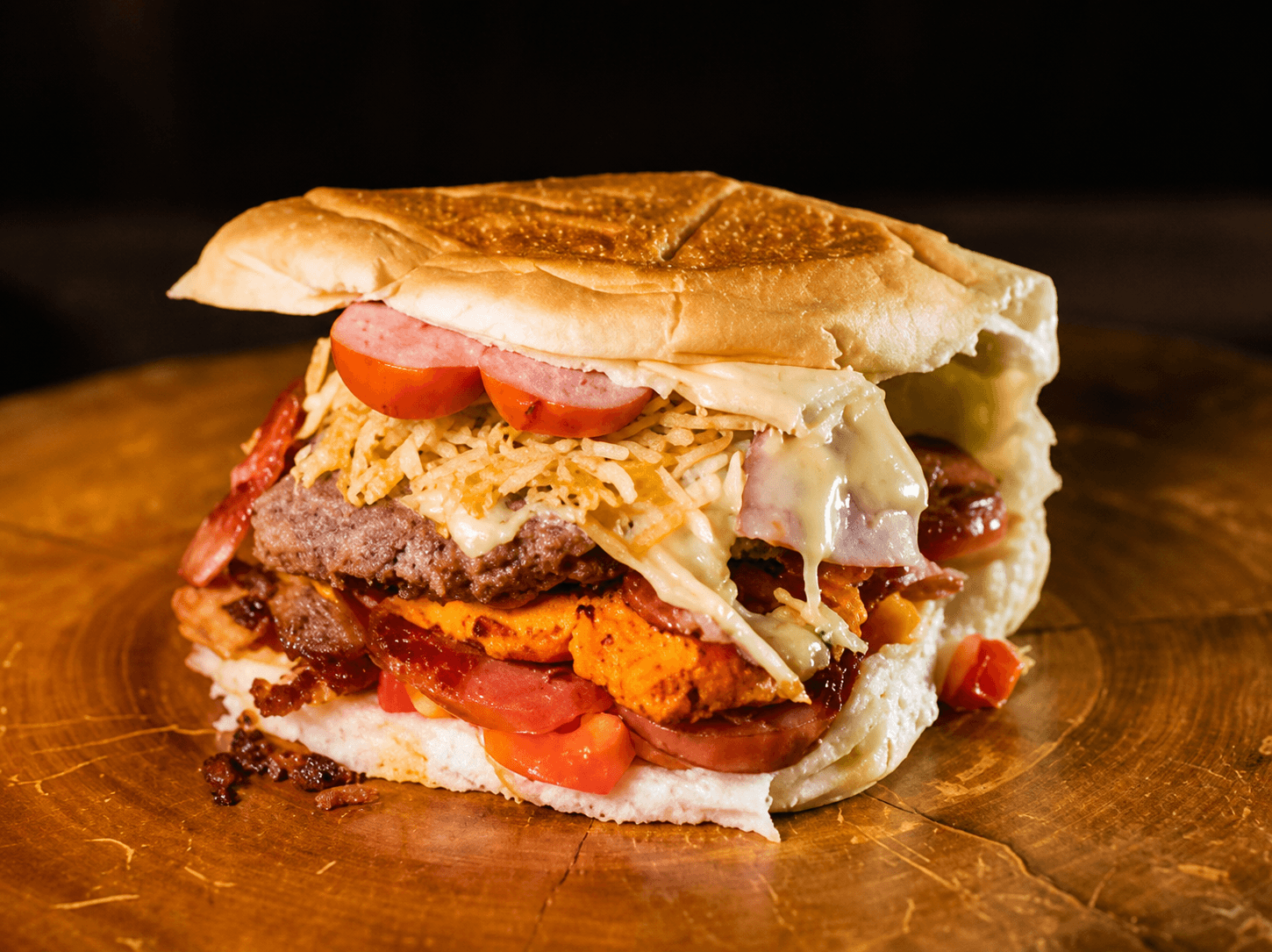 X Bagunça do Primo's Lanches com carnes preparadas na chapa